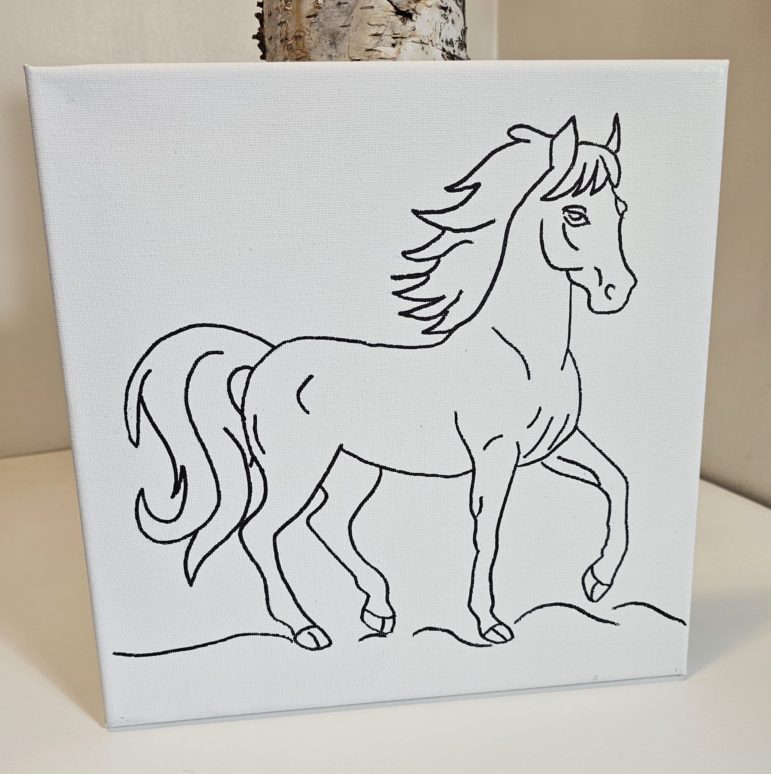 Horse canvas leaning on a warm-toned rustic background