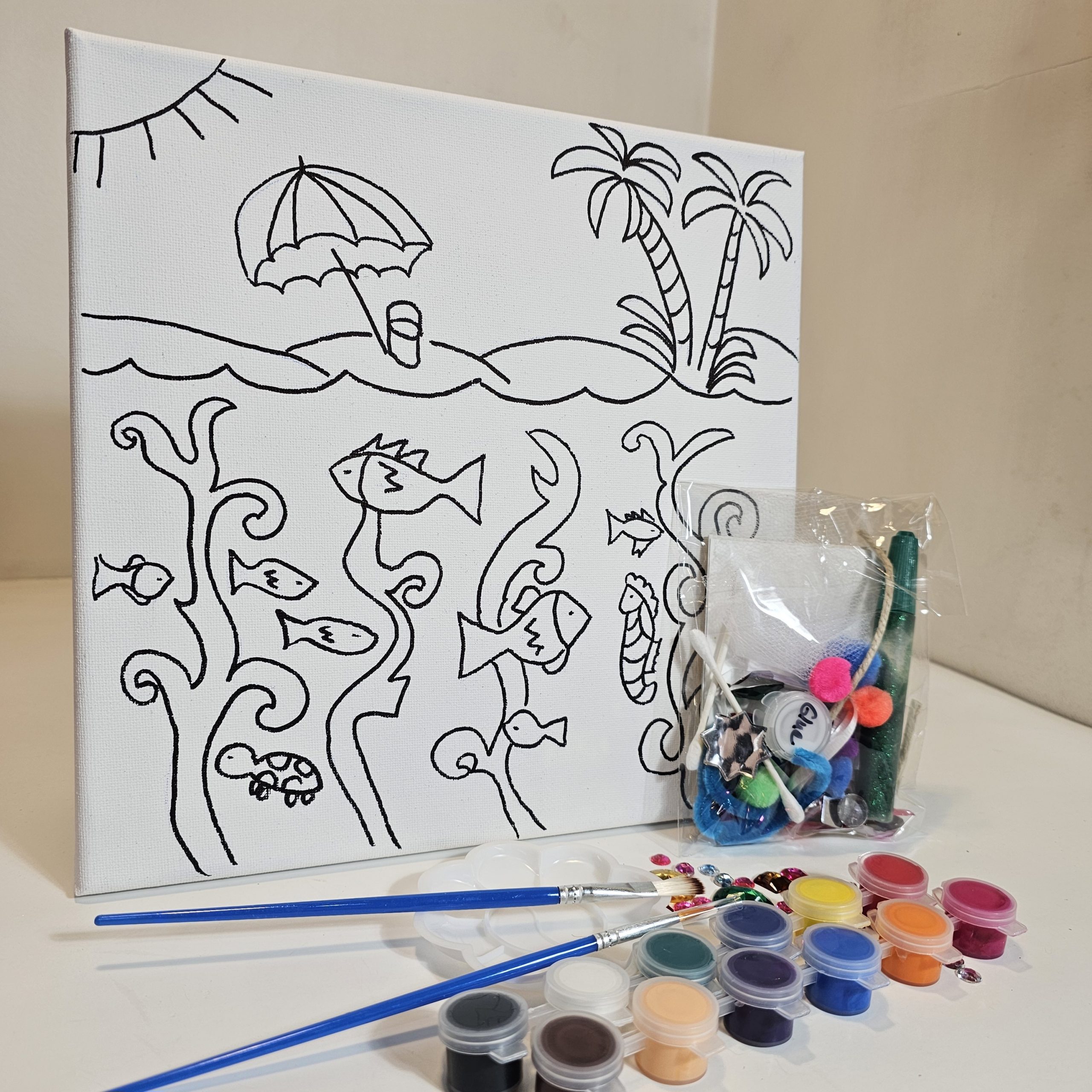 Full Under the Sea art kit with paint, glue, and collage supplies displayed