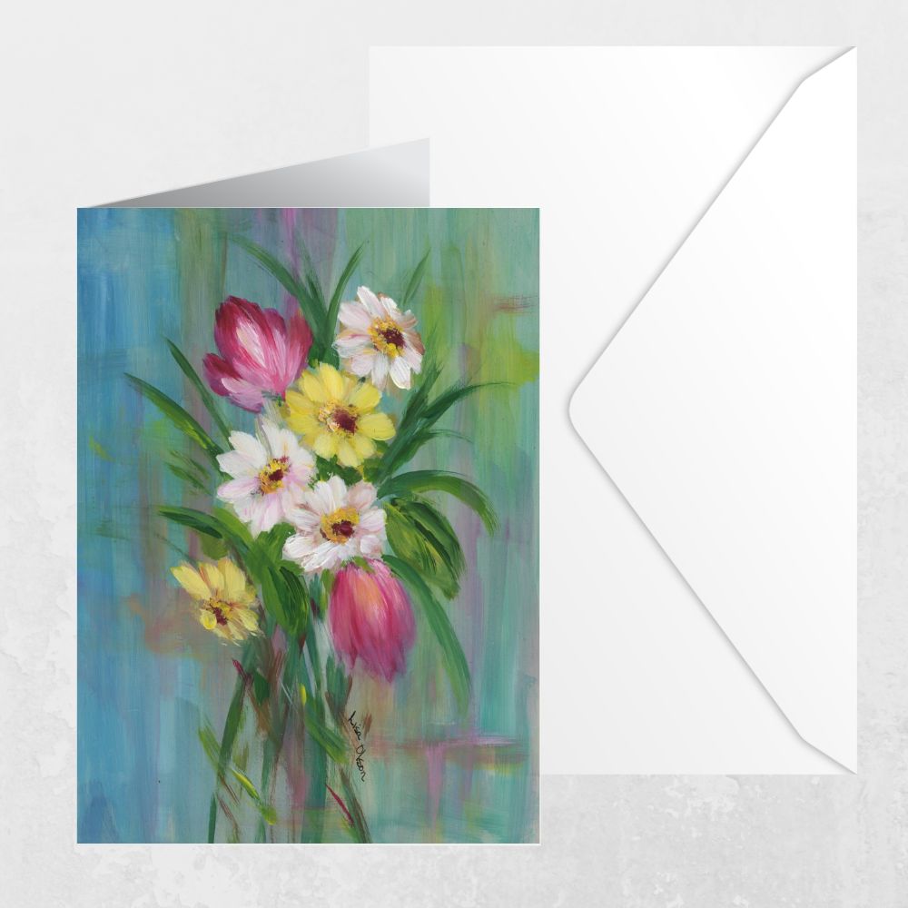 Greeting card featuring a spring bouquet with daisies and tulips beside an envelope