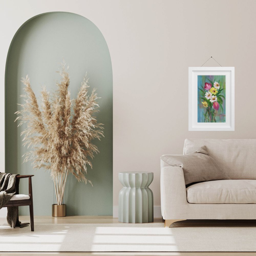 Spring bouquet print matted to 11x14 in frame hanging above couch