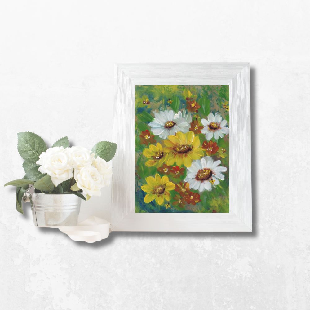 Greeting card in a white frame styled on a table