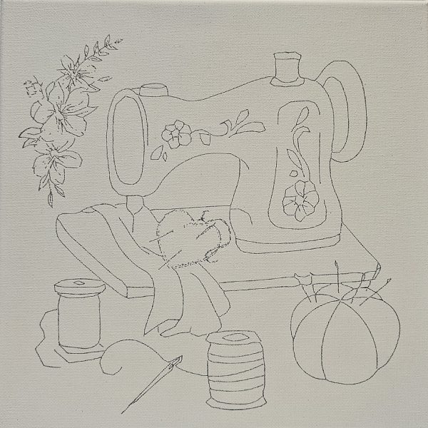 Flat lay of 10x10 Creative You Canvas featuring sewing machine, heart, and floral elements