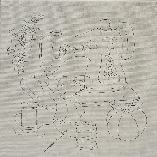 Flat lay of 10x10 Creative You Canvas featuring sewing machine, heart, and floral elements