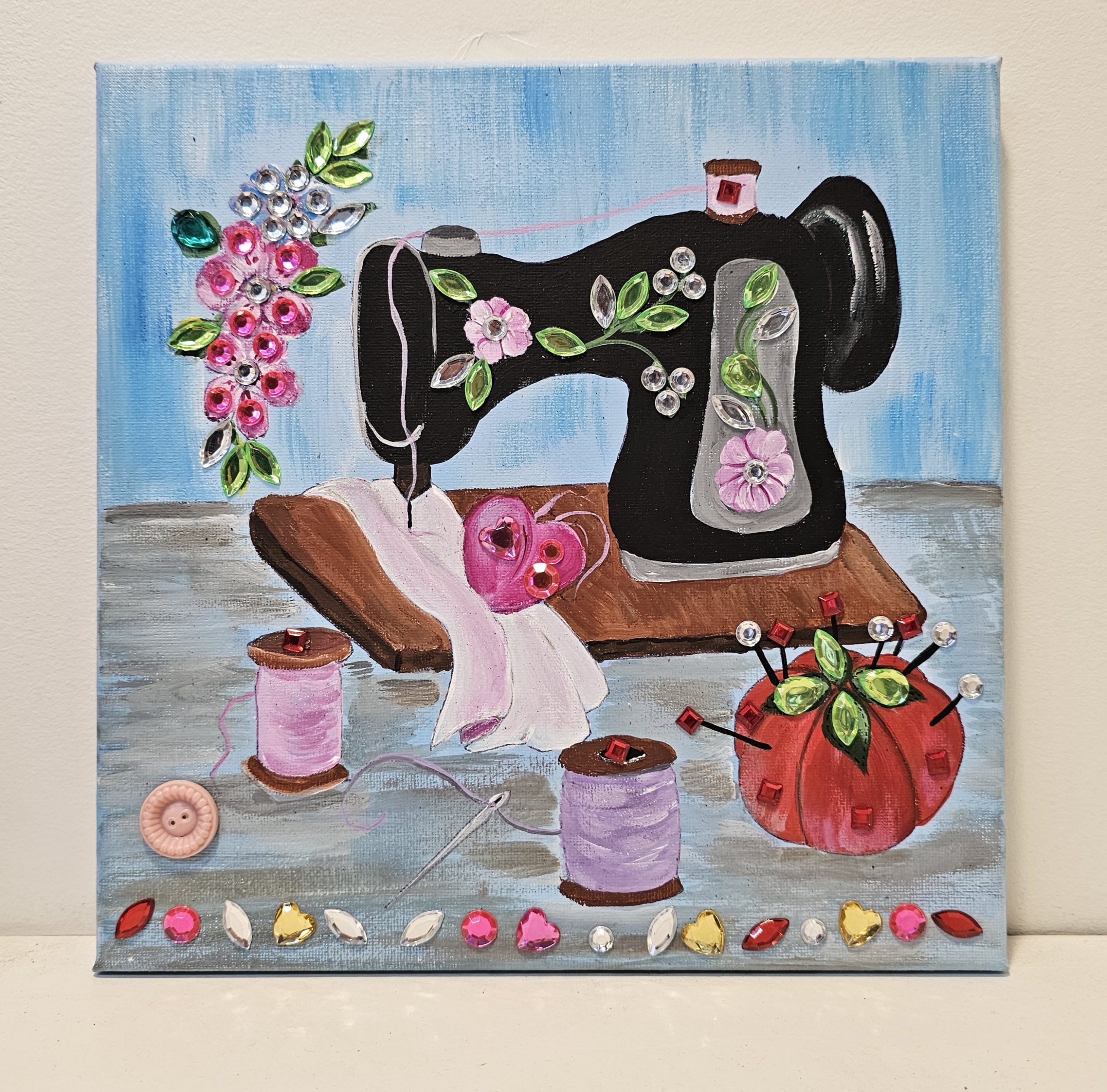 Finished sewing machine canvas with floral and heart details