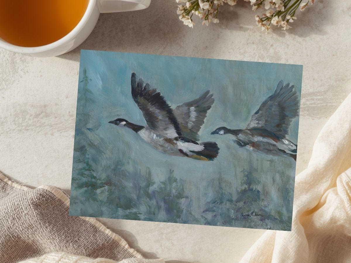 watercolor art greeting card on table with coffee soft natural light handmade